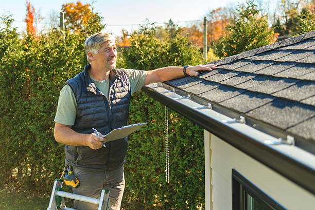 Professional Hail Damage Roof Repair technician working in Bixby, OK